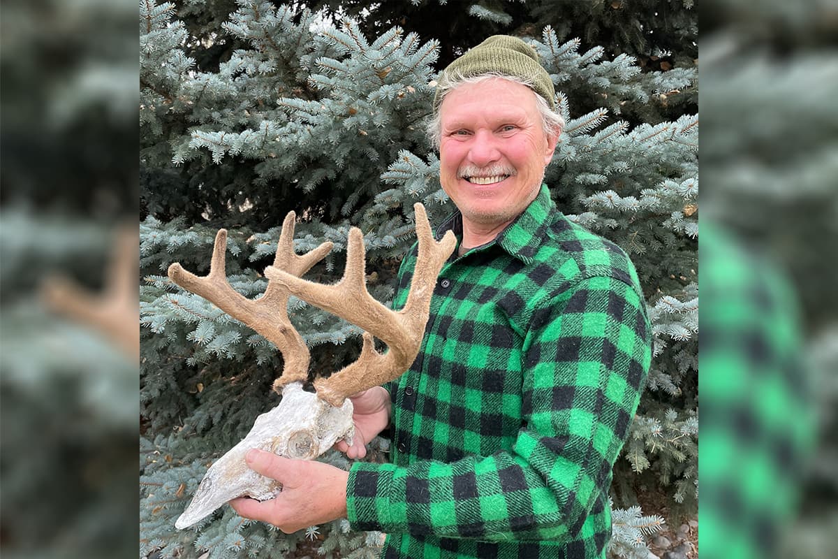 Chuck Adams, Archery Legend, and His New World Record Sitka Buck logo