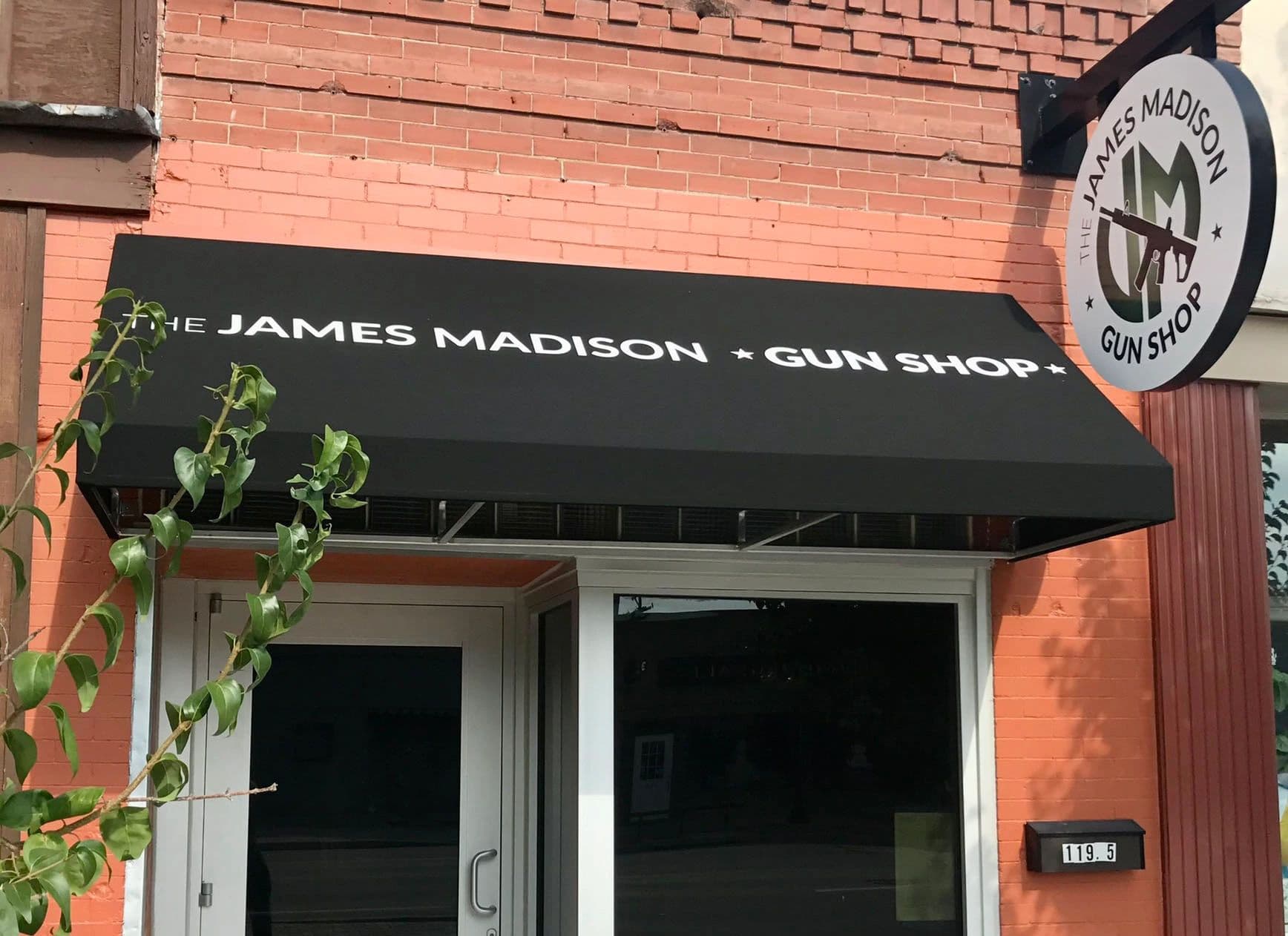 The James Madison Gun Shop logo
