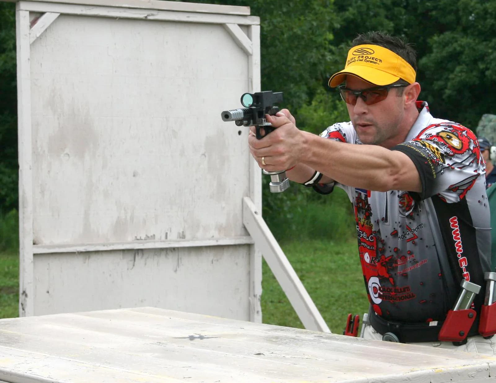 Open division master class competition shooter at practical pistol match