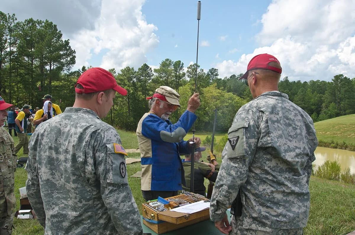 Team USA member loading blackpowder rifle at 2015 MLAIC Long Range Championship