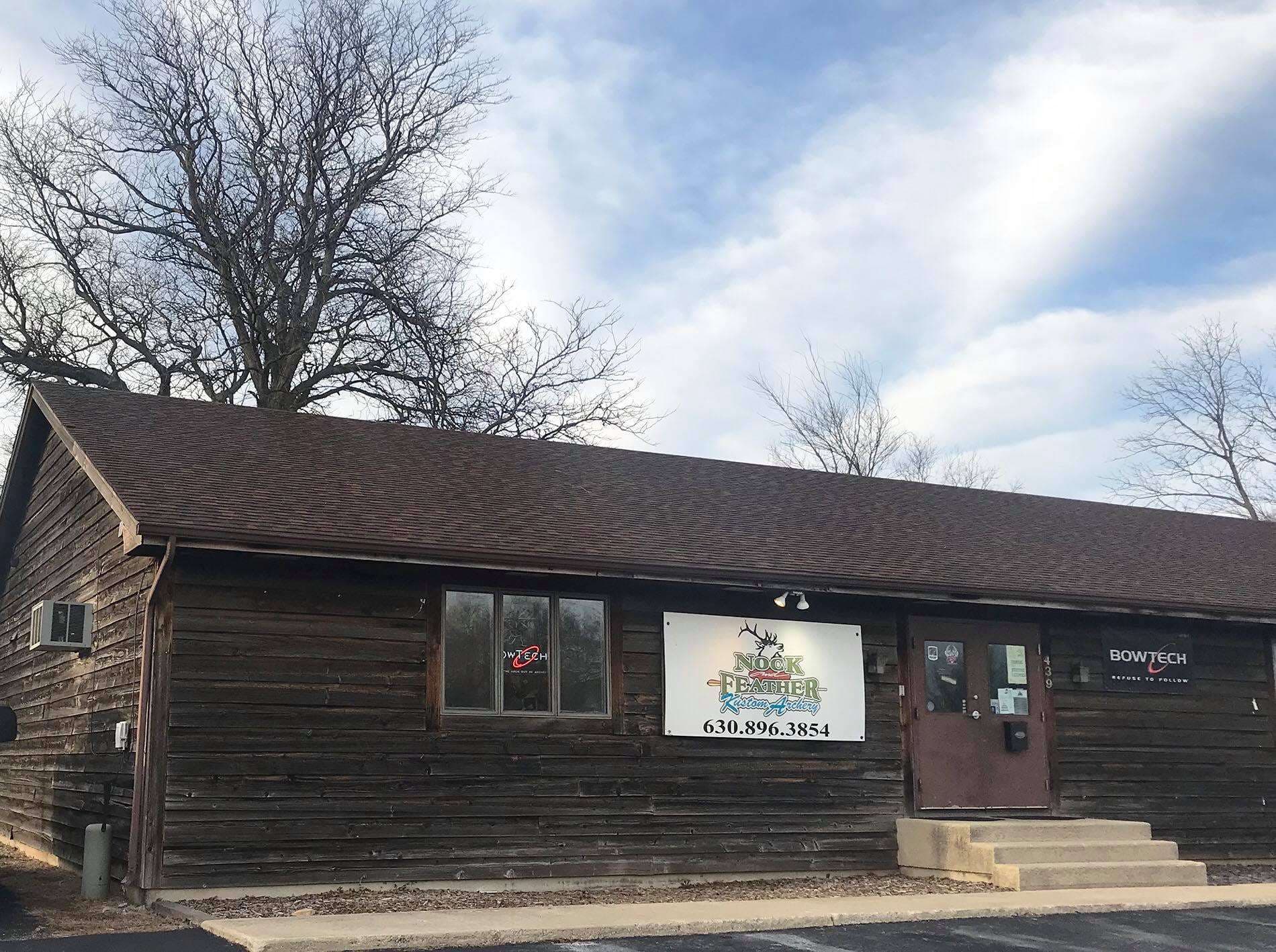 Nock & Feather Kustom Archery - Enjoy Illinois logo