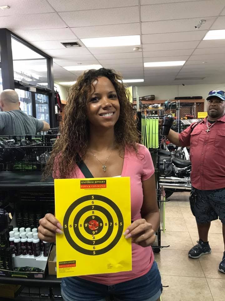 Universal Jewelry Pawn & Gun Range logo