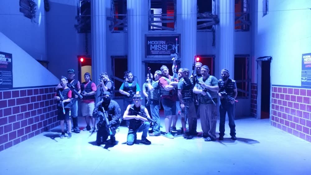 Modern Mission - Outdoor Laser Tag + Airsoft + Axe Throwing logo